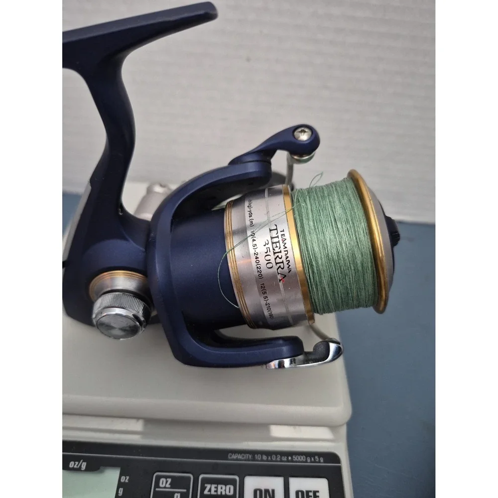 Team Daiwa Teierra 3500 Fishing Spinning Reel Prespooled 12 Ib Braid